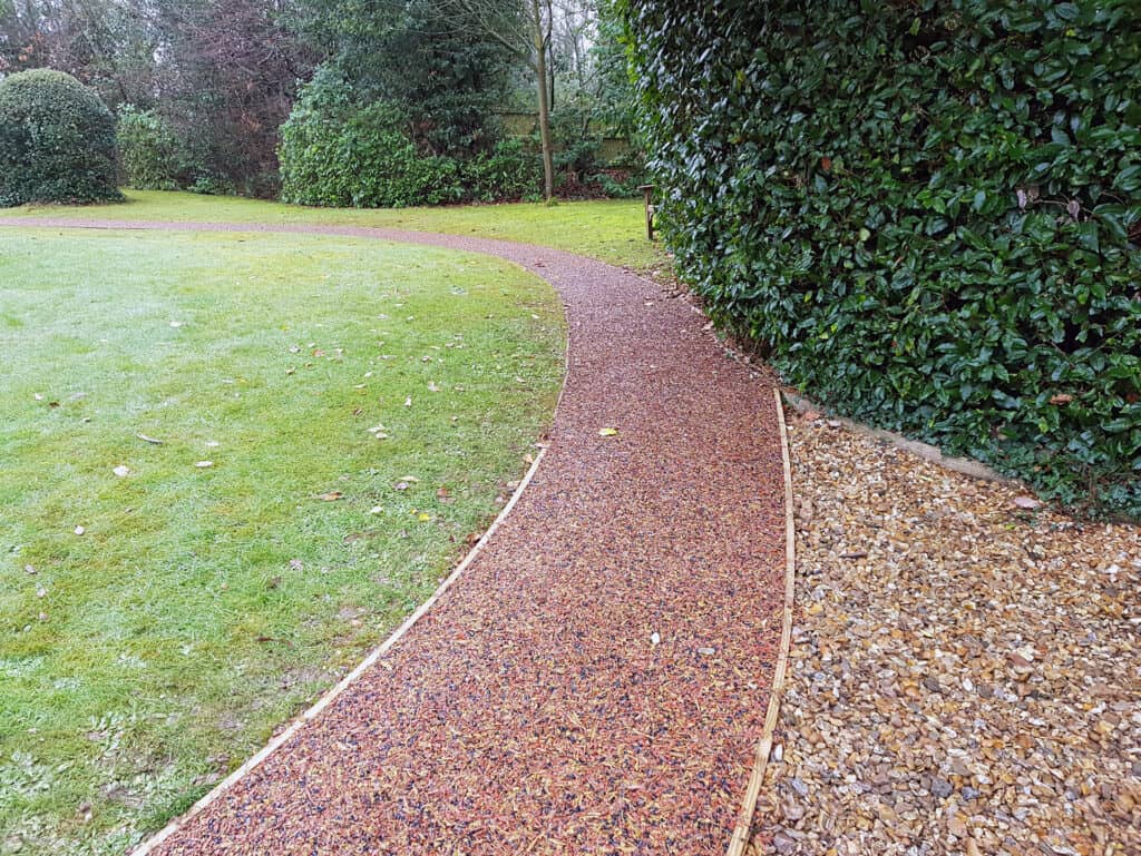 A public space with a recycled rubber mulch pathway