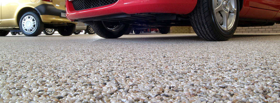 An indoor stone carpet used for a large garage